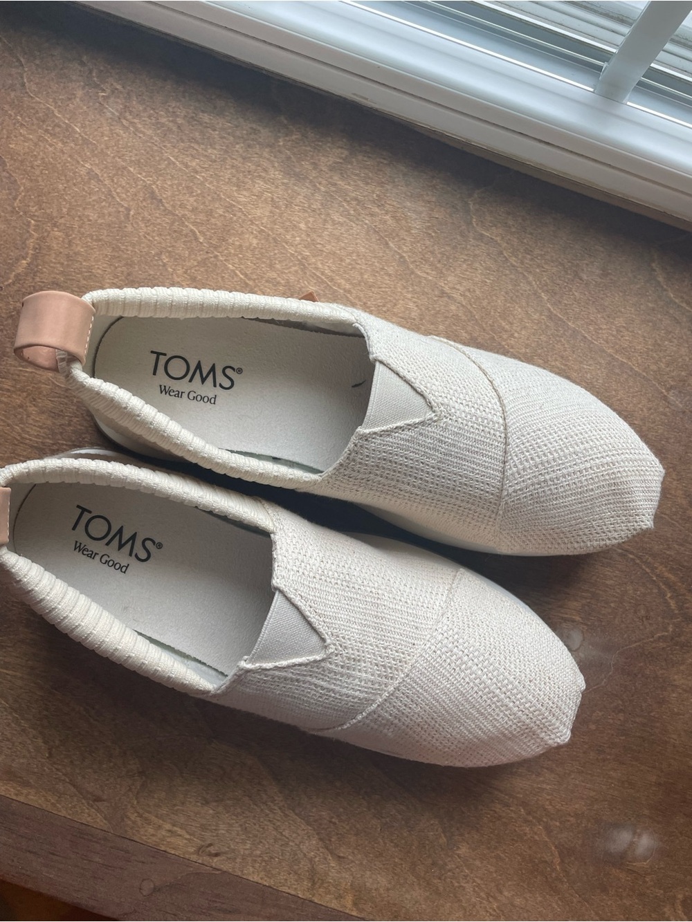 TOMS Women's Slip-On Flats in Cream with Blush Heel Tab